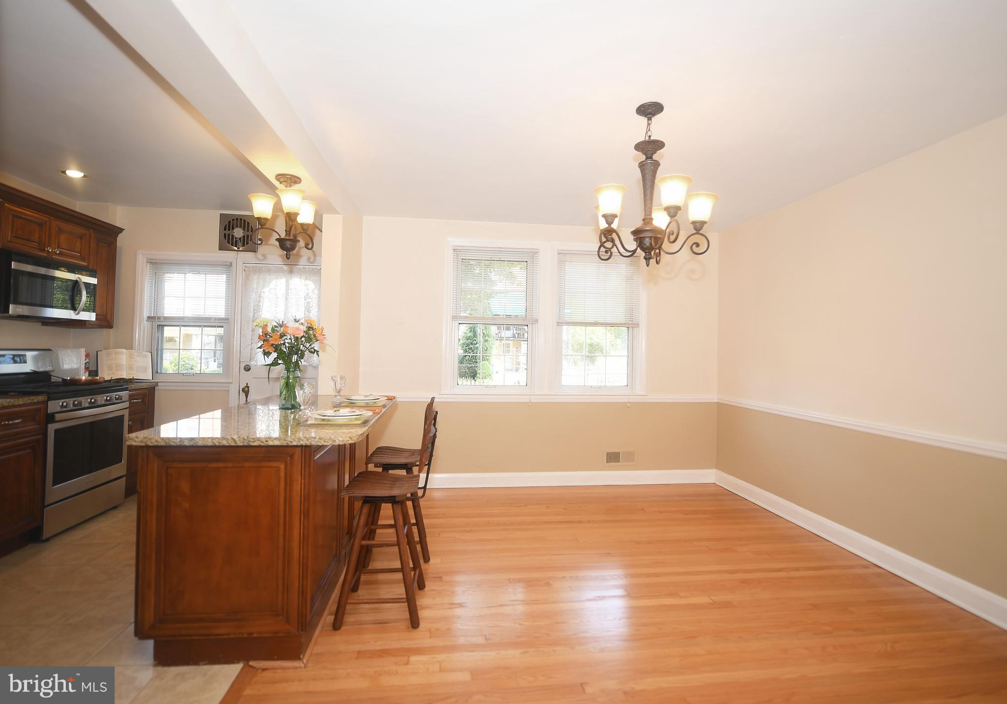 430 Stratford Road Baltimore, MD 21228 - Photo 11 of 35 Entertain and eat around this large kitchen island