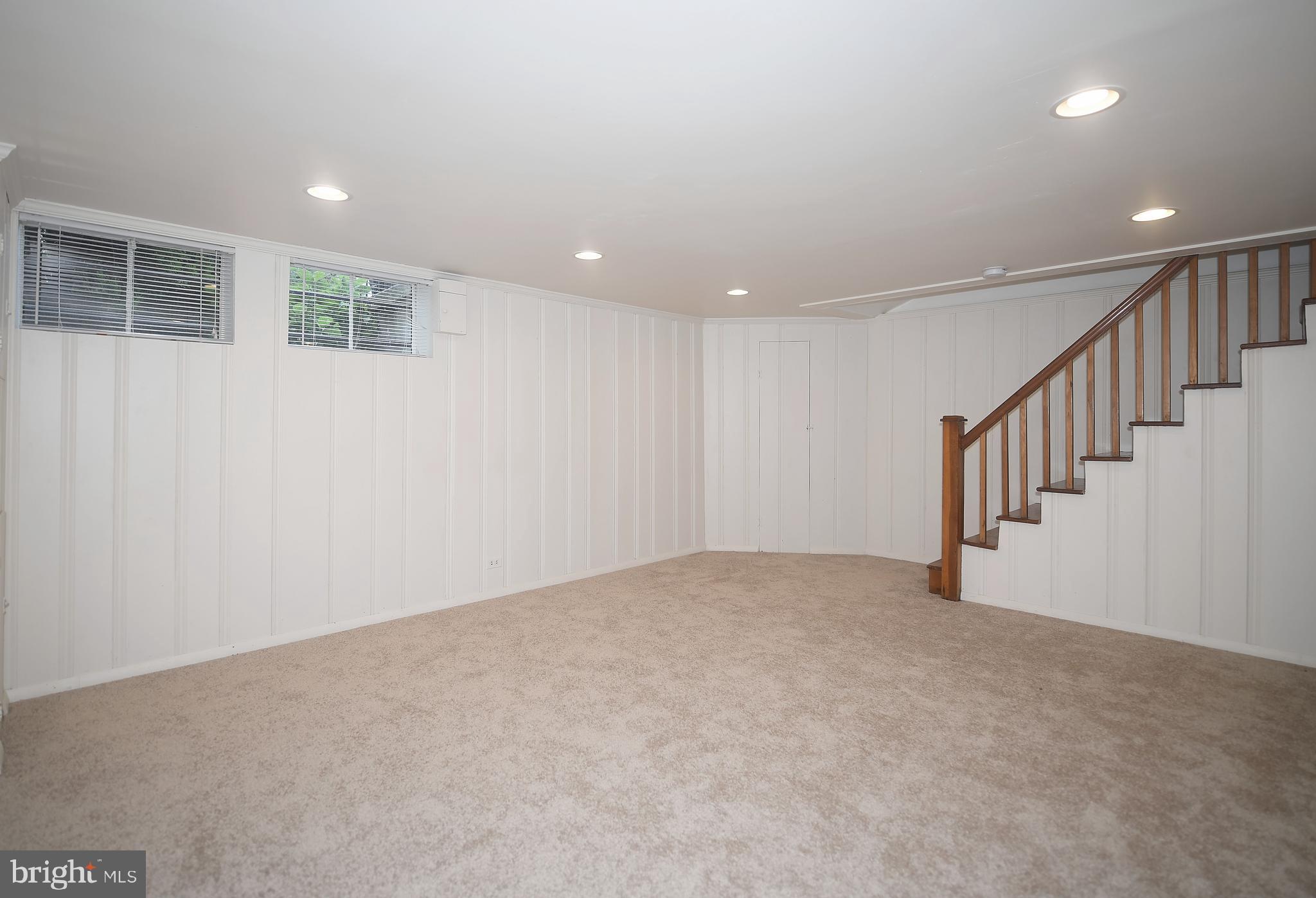 430 Stratford Road Baltimore, MD 21228 - Photo 29 of 35 Wide open bright basement for additional space