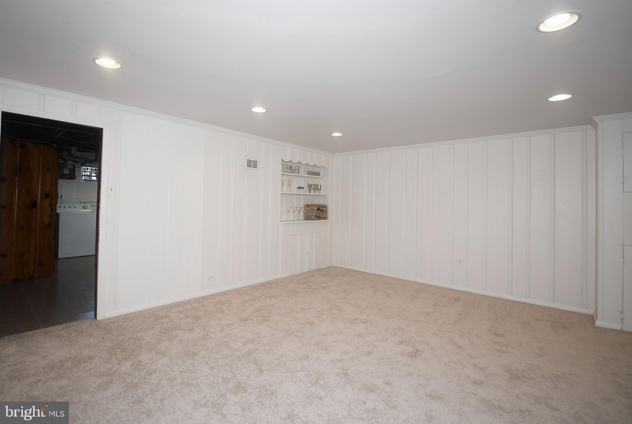430 Stratford Road Baltimore, MD 21228 - Photo 31 of 35 Wide open bright basement for additional space