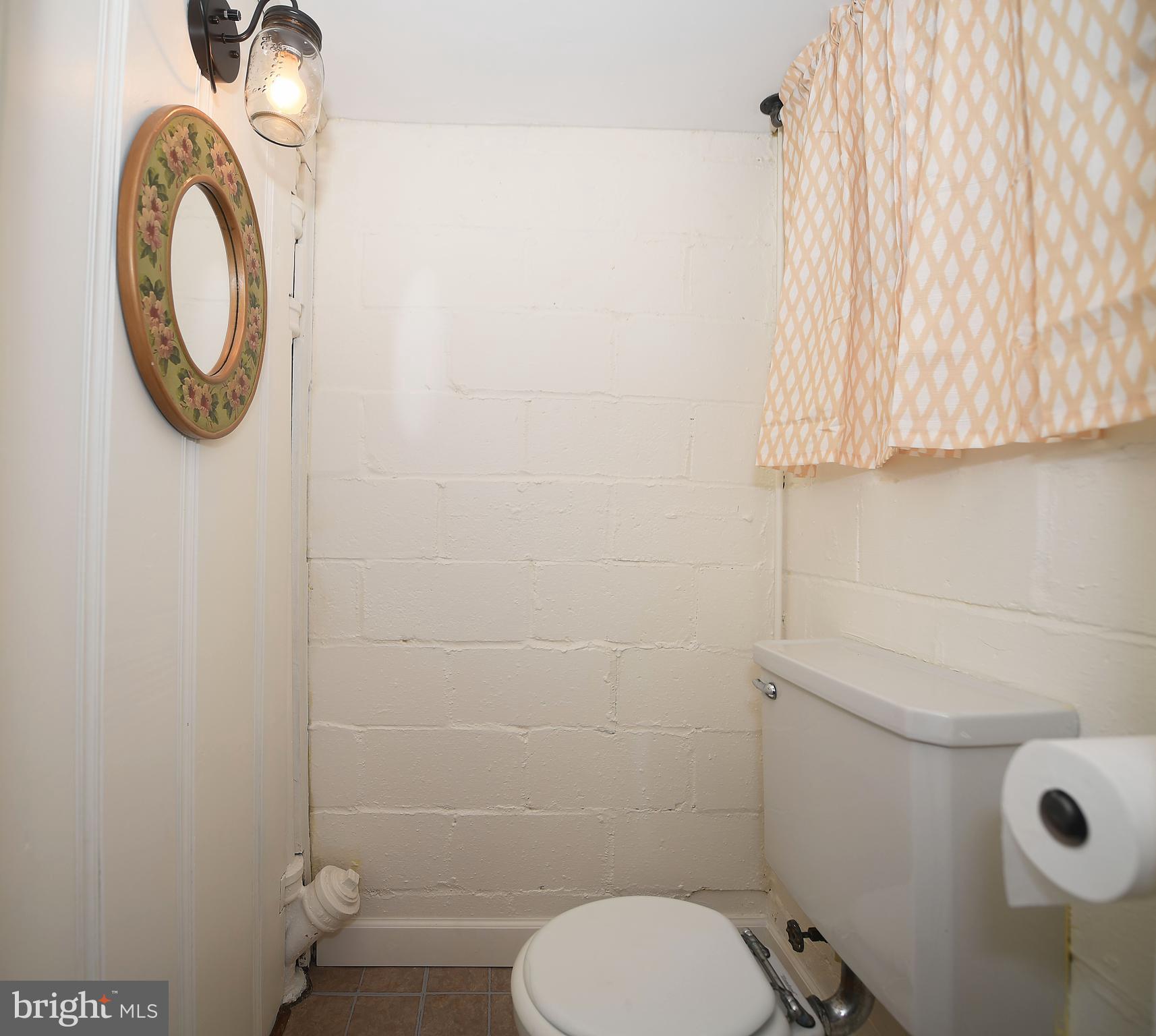 430 Stratford Road Baltimore, MD 21228 - Photo 34 of 35 Convenient clean half bath on lower level