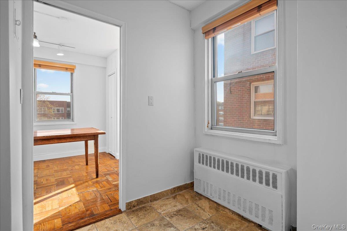 230 Garth Road, Unit 7D1 Scarsdale, NY 10583 - Photo 13 of 31 Eat in Kitchen with window and room for a cafe table