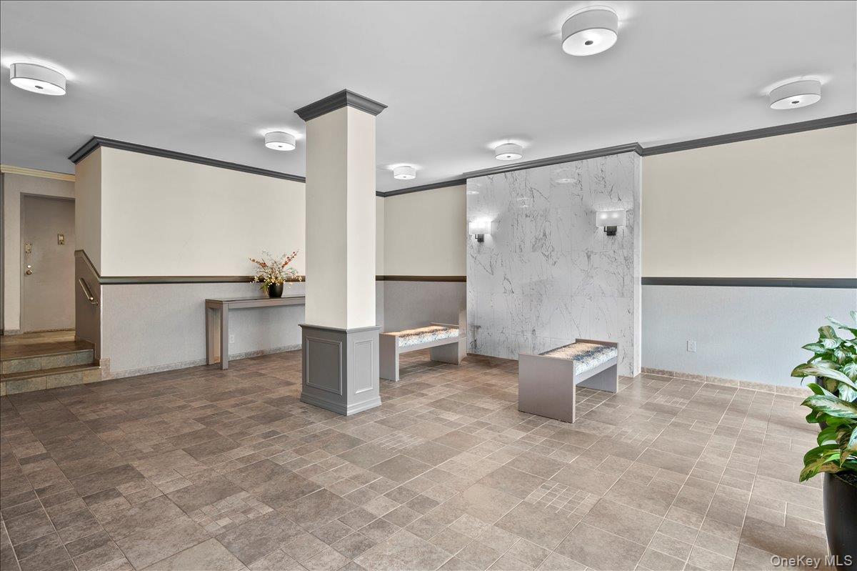 230 Garth Road, Unit 7D1 Scarsdale, NY 10583 - Photo 25 of 31 lobby with ramp