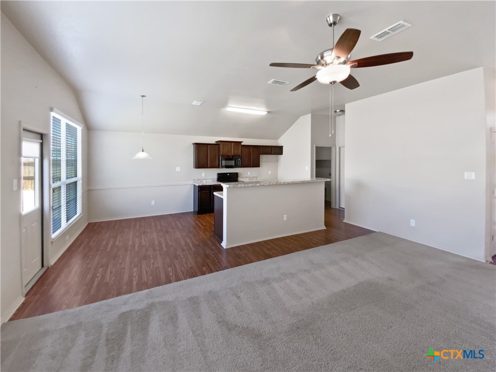 2501 Stoneham Temple, TX 76504 - Photo 11 of 19 a view of a kitchen with a sink and a ceiling fan