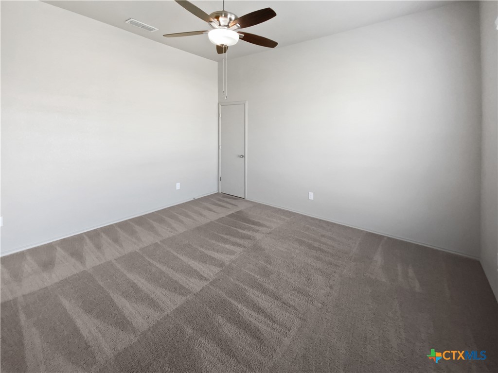 2501 Stoneham Temple, TX 76504 - Photo 15 of 19 an empty room with a window and a fan