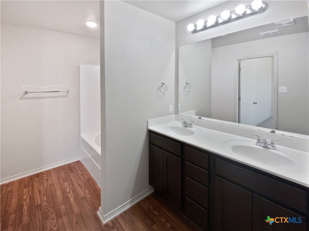 2501 Stoneham Temple, TX 76504 - Photo 7 of 19 a bathroom with a sink and a mirror