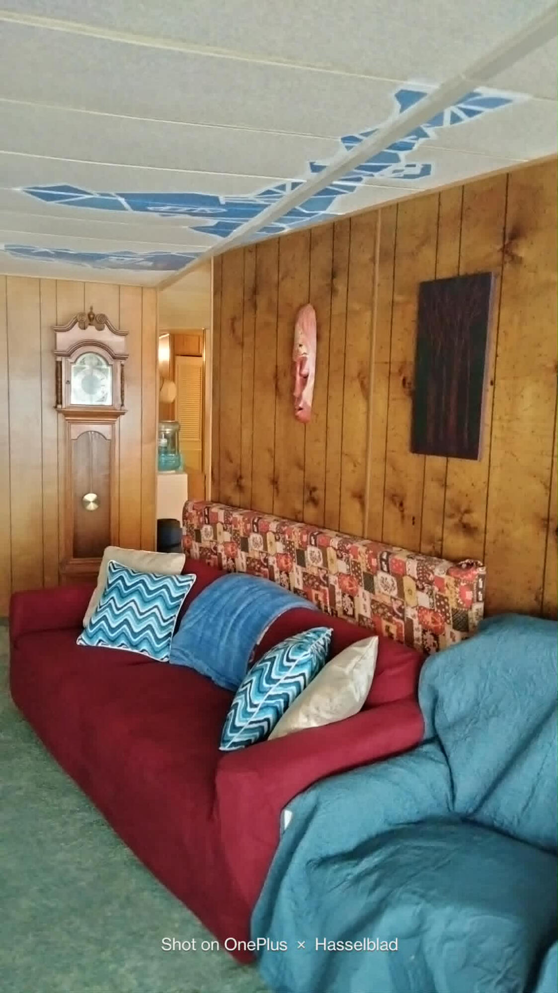 575 Kirkham Road Cave Junction, OR 97523 - Photo 16 of 45 a bedroom with a bed and window