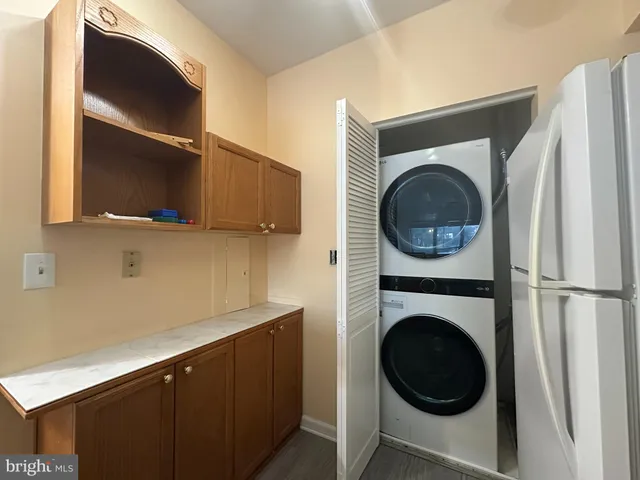 a view of a kitchen with washer and dryer