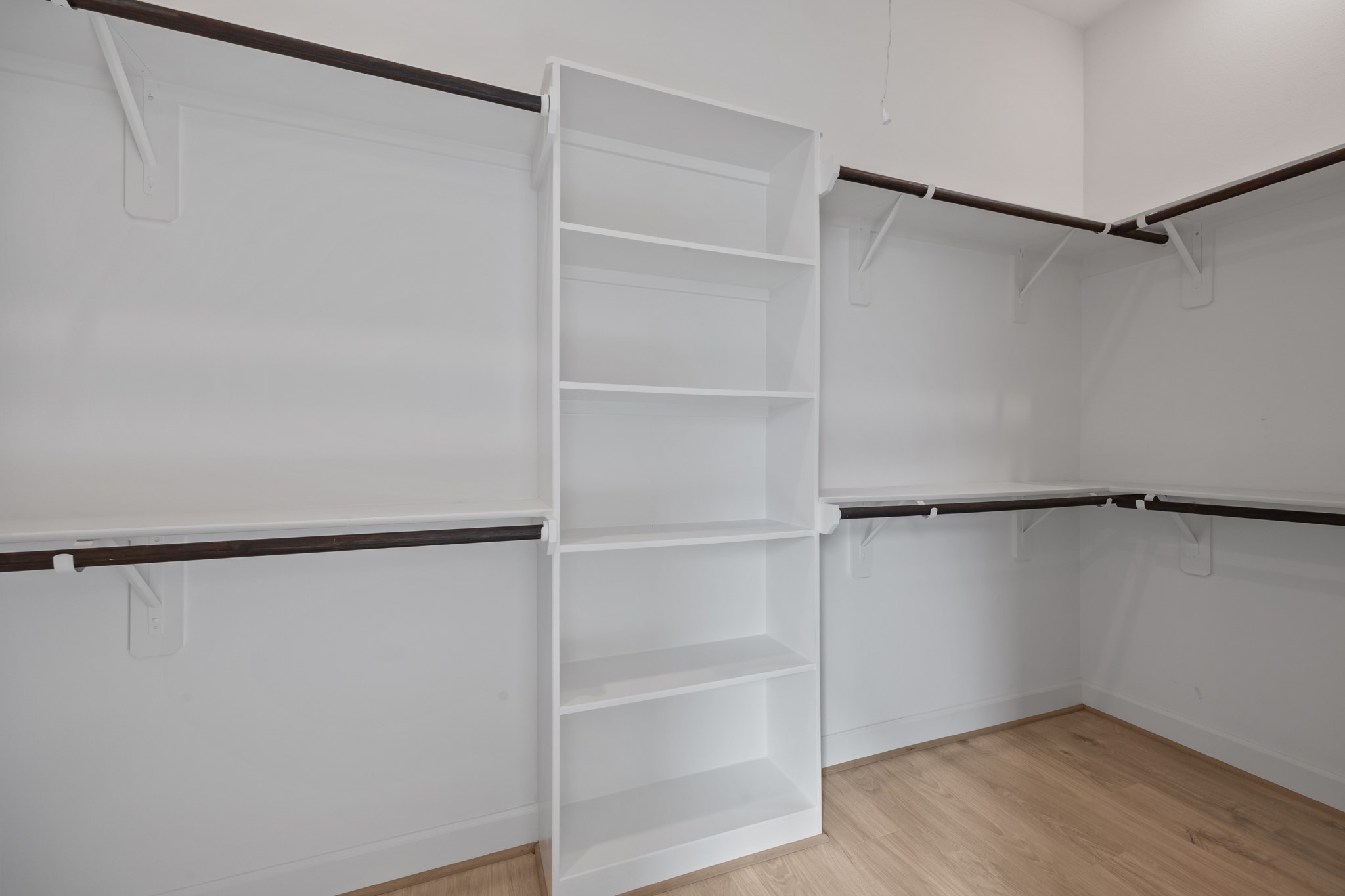 2505 South Houston Avenue Pearland, TX 77581 - Photo 11 of 24 a view of an empty walk in closet