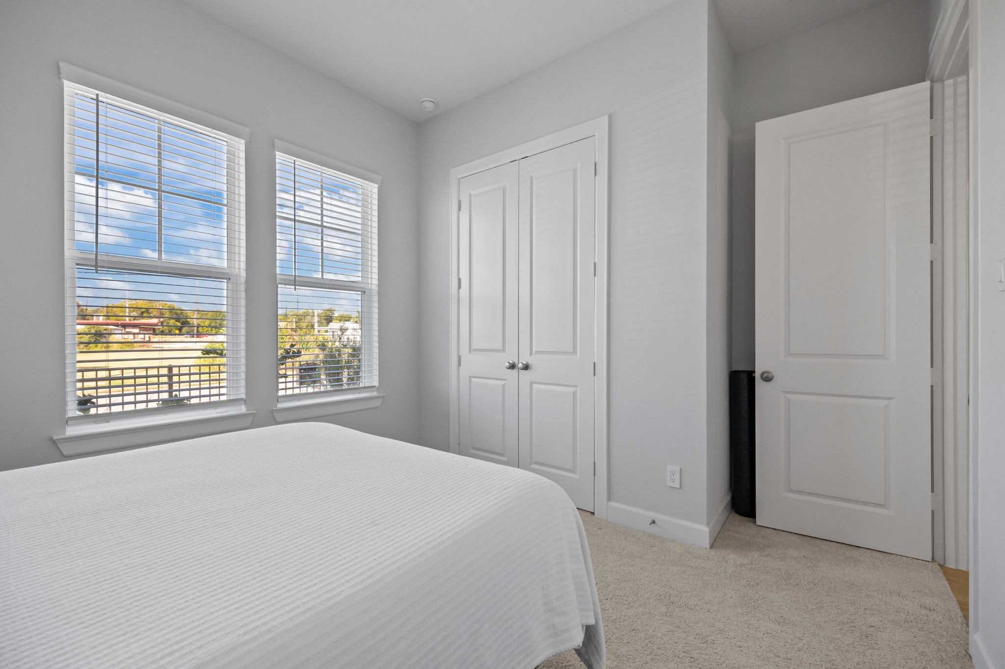 2505 South Houston Avenue Pearland, TX 77581 - Photo 14 of 24 a view of a bedroom with a bed and a window