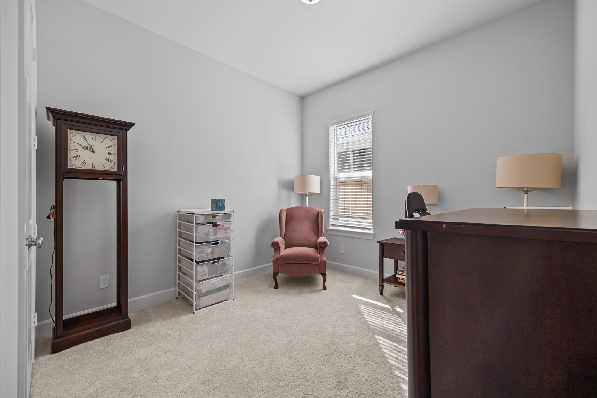 2505 South Houston Avenue Pearland, TX 77581 - Photo 17 of 24 a bedroom with furniture and a window