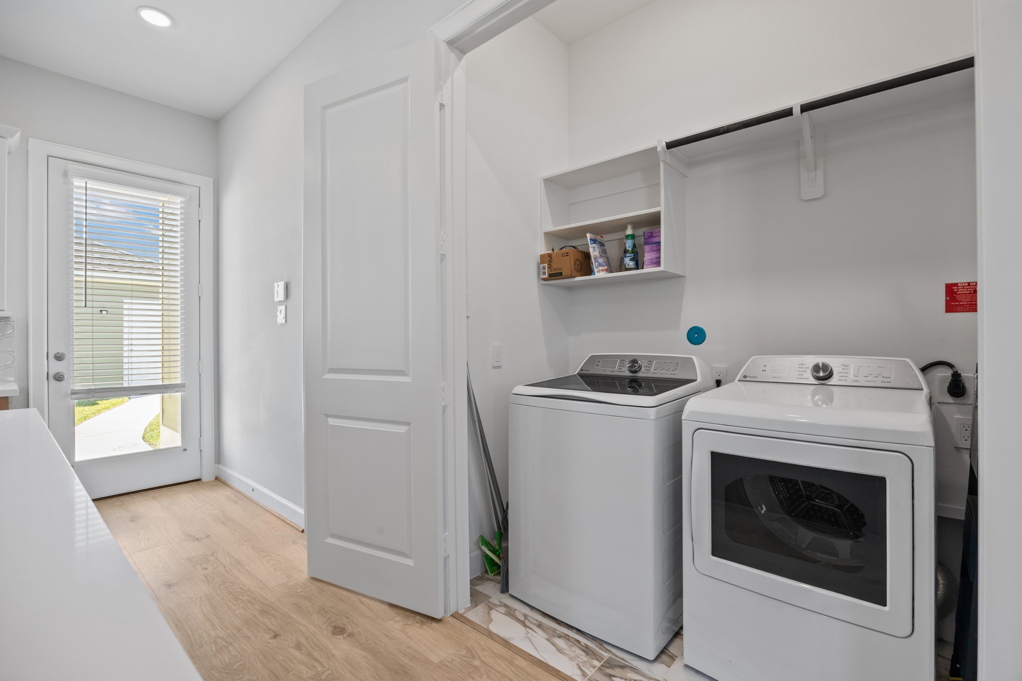 2505 South Houston Avenue Pearland, TX 77581 - Photo 18 of 24 a utility room with dryer and washer