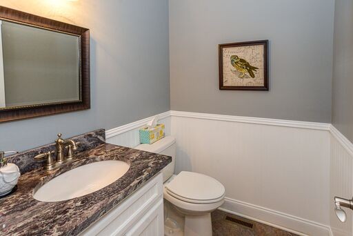 228 Wabash Road Fayetteville, TN 37334 - Photo 13 of 50 a bathroom with a granite countertop sink mirror vanity and toilet