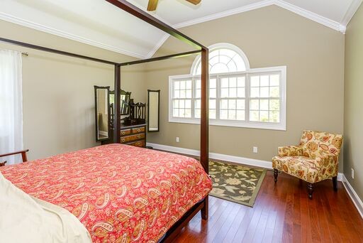 228 Wabash Road Fayetteville, TN 37334 - Photo 16 of 50 a bed sitting in a bedroom next to a window