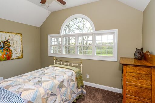 228 Wabash Road Fayetteville, TN 37334 - Photo 17 of 50 a bedroom with a bed and a window