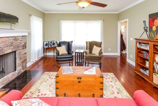 228 Wabash Road Fayetteville, TN 37334 - Photo 21 of 50 a living room with fireplace furniture and a wooden floor