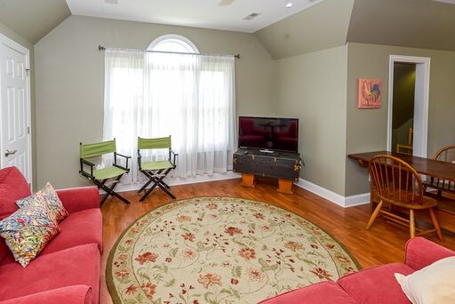 228 Wabash Road Fayetteville, TN 37334 - Photo 29 of 50 a living room with furniture and a flat screen tv
