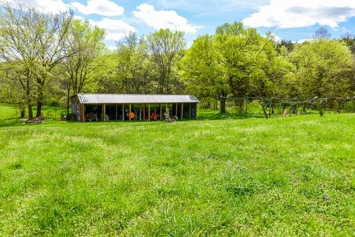 228 Wabash Road Fayetteville, TN 37334 - Photo 34 of 50 a view of a house with a big yard
