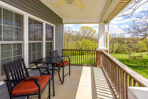 228 Wabash Road Fayetteville, TN 37334 - Photo 4 of 50 a view of a two chairs and table in the balcony