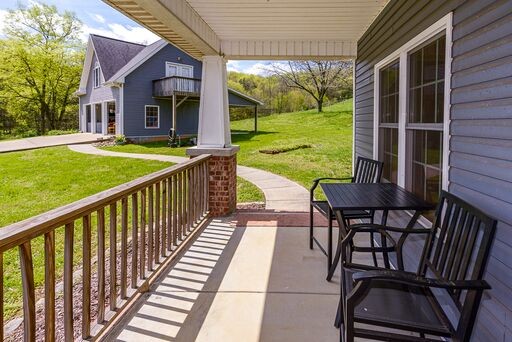 228 Wabash Road Fayetteville, TN 37334 - Photo 5 of 50 a view of a house with backyard and porch