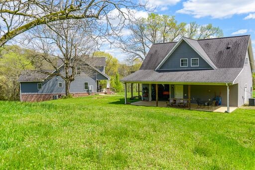 228 Wabash Road Fayetteville, TN 37334 - Photo 10 of 50 a view of a house with a yard and sitting area