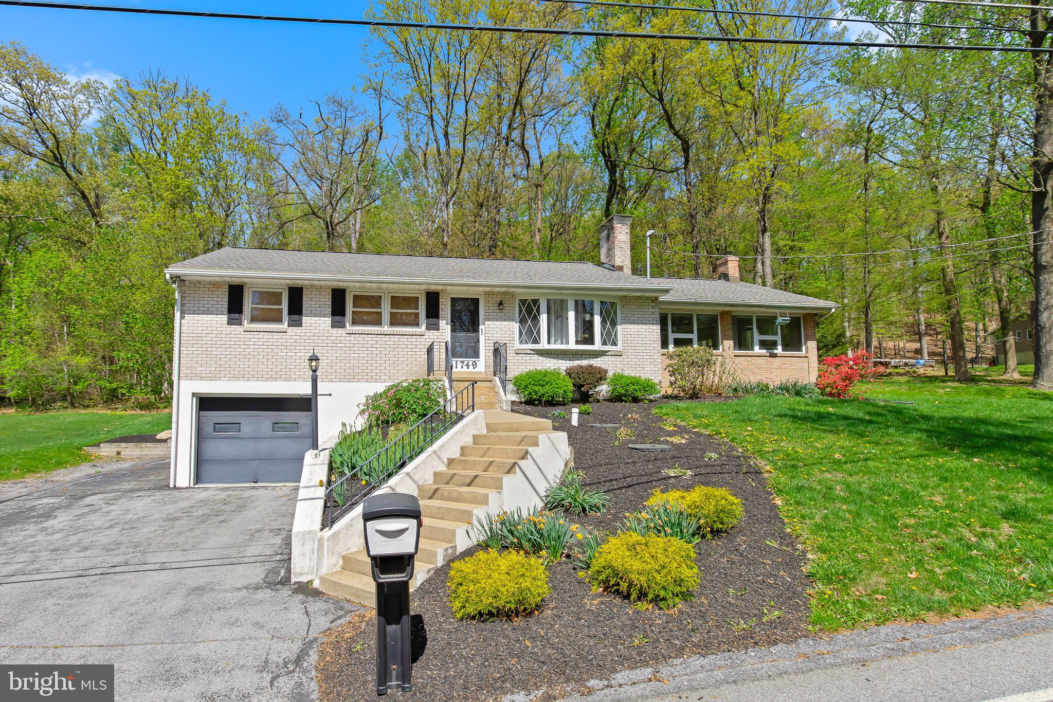 1749 Ramich Road Temple, PA 19560 - Photo 1 of 48 front view of a house with a yard