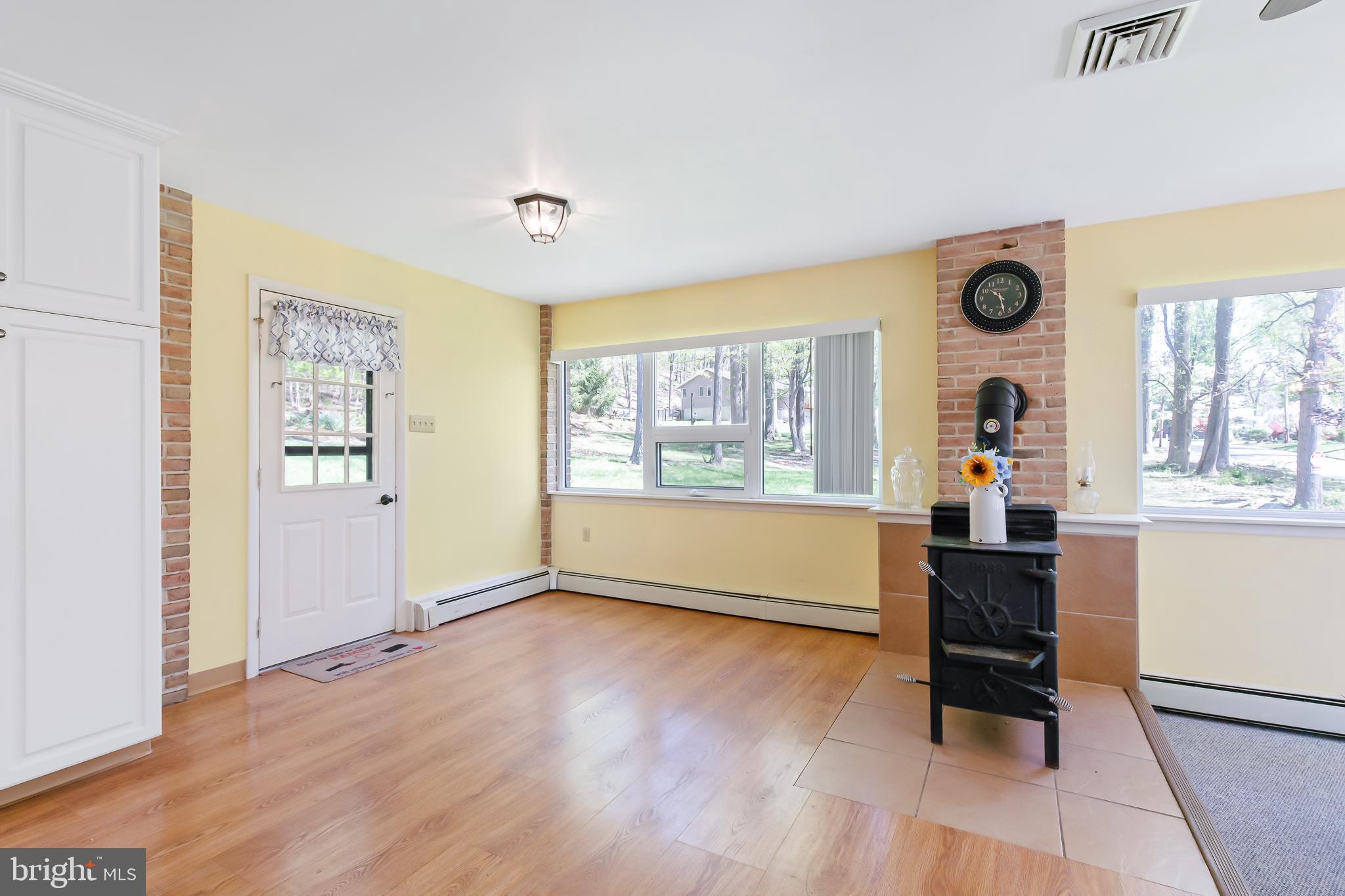 1749 Ramich Road Temple, PA 19560 - Photo 14 of 48 a living room with furniture and a window