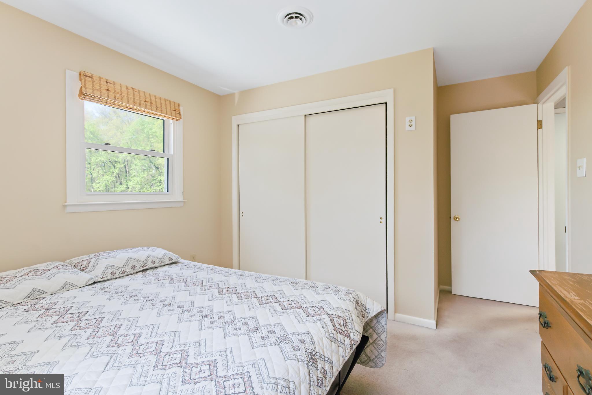1749 Ramich Road Temple, PA 19560 - Photo 29 of 48 a bedroom with a bed and a window