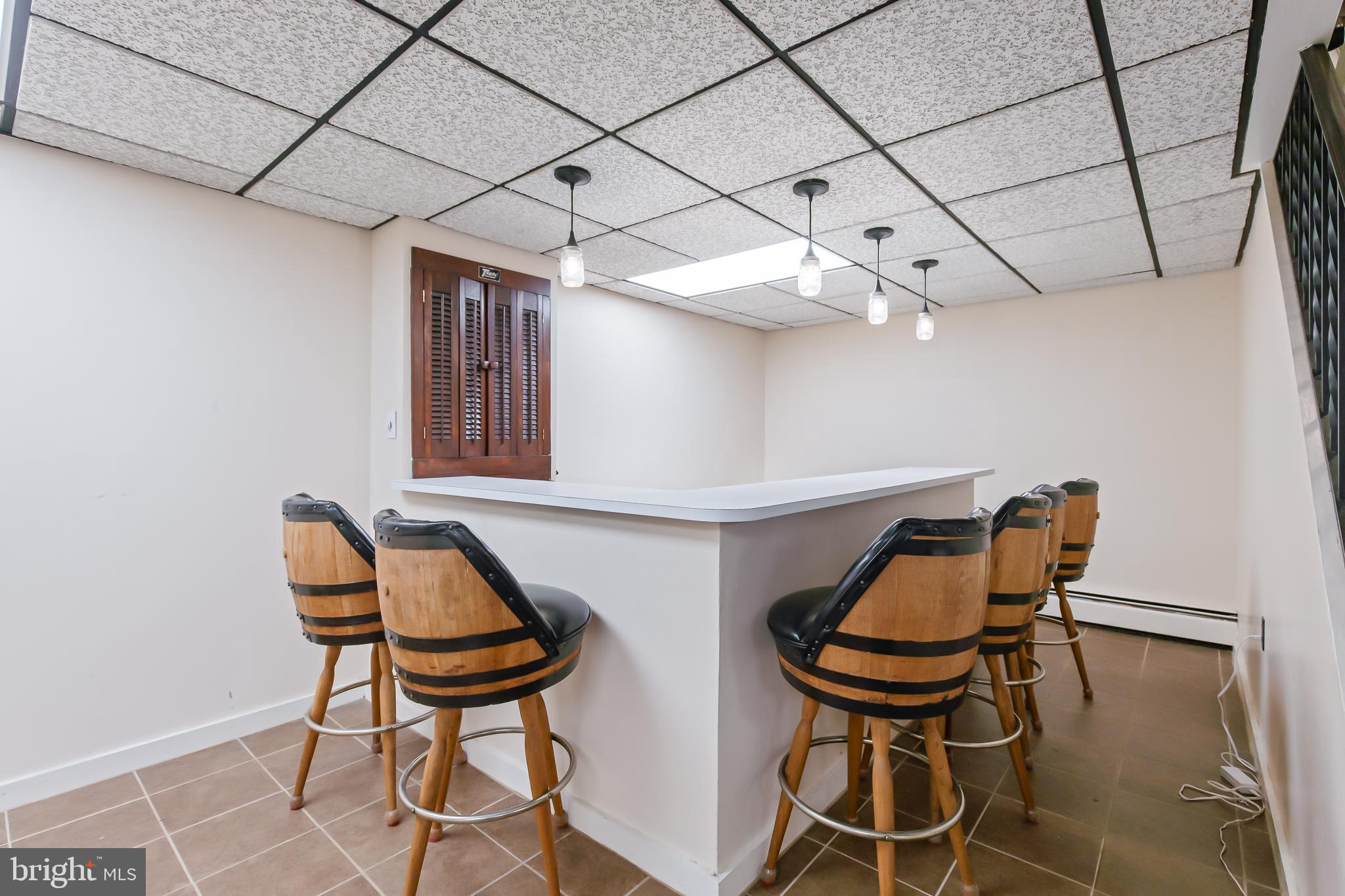 1749 Ramich Road Temple, PA 19560 - Photo 32 of 48 a view of a dining room with furniture and wooden floor