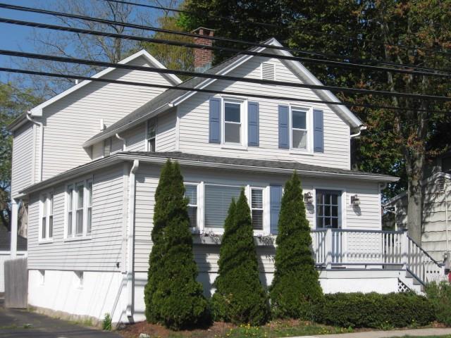 346 Reef Road Fairfield, CT 06824 - Photo 1 of 1 a front view of a house with a yard