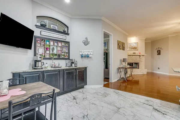 a open kitchen with stainless steel appliances kitchen island granite countertop a sink and cabinets