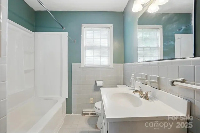 a bathroom with a sink and a bathtub