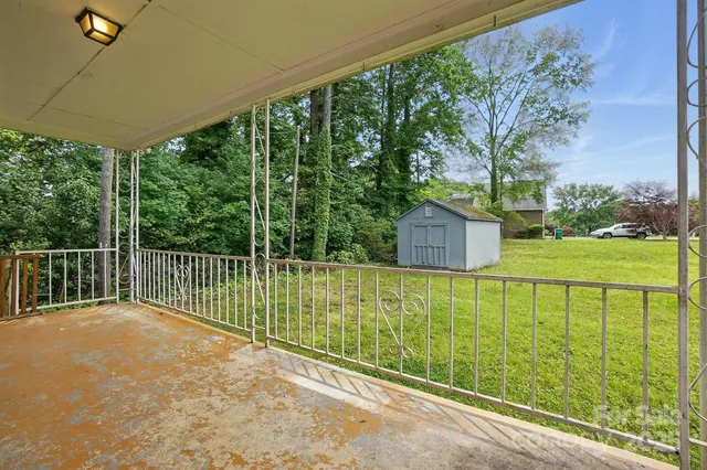 a view of a backyard with a garden