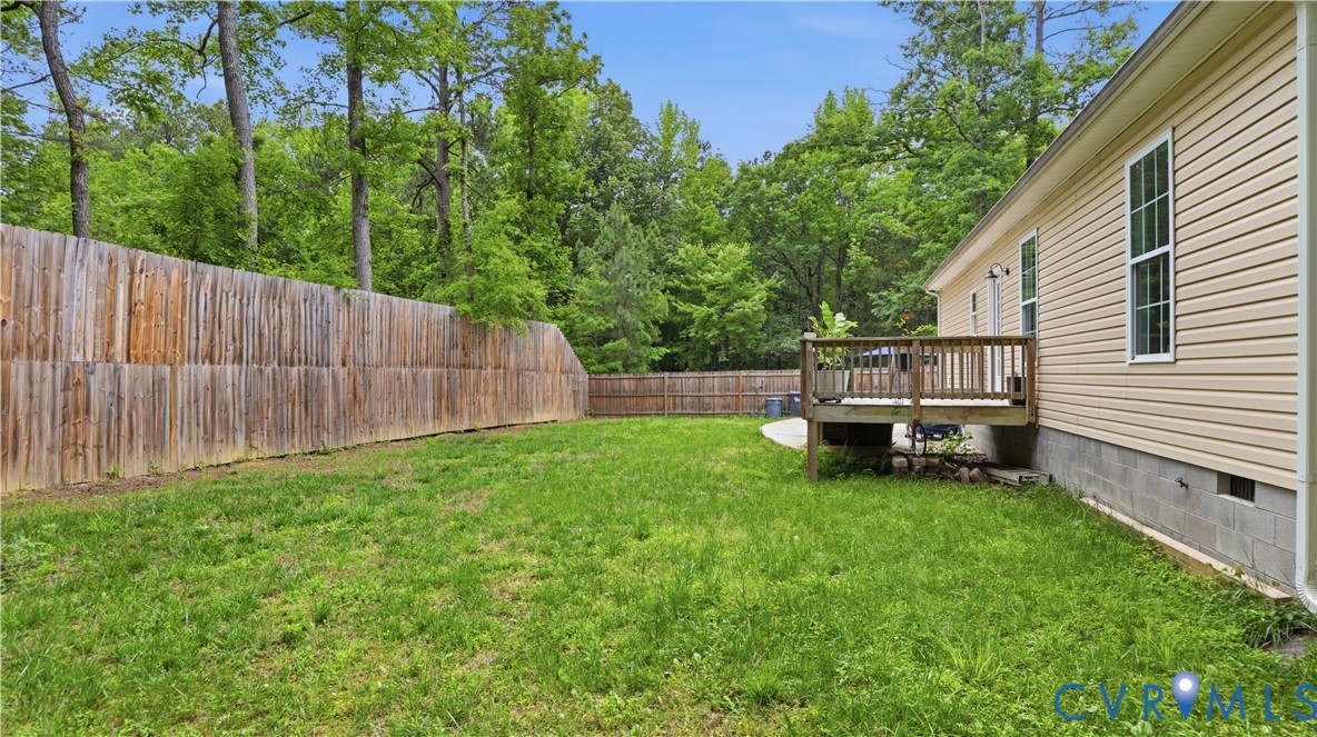 2406 Emanuel Church Road Powhatan, VA 23139 - Photo 34 of 48 Expansive backyard featuring a wood privacy fence,