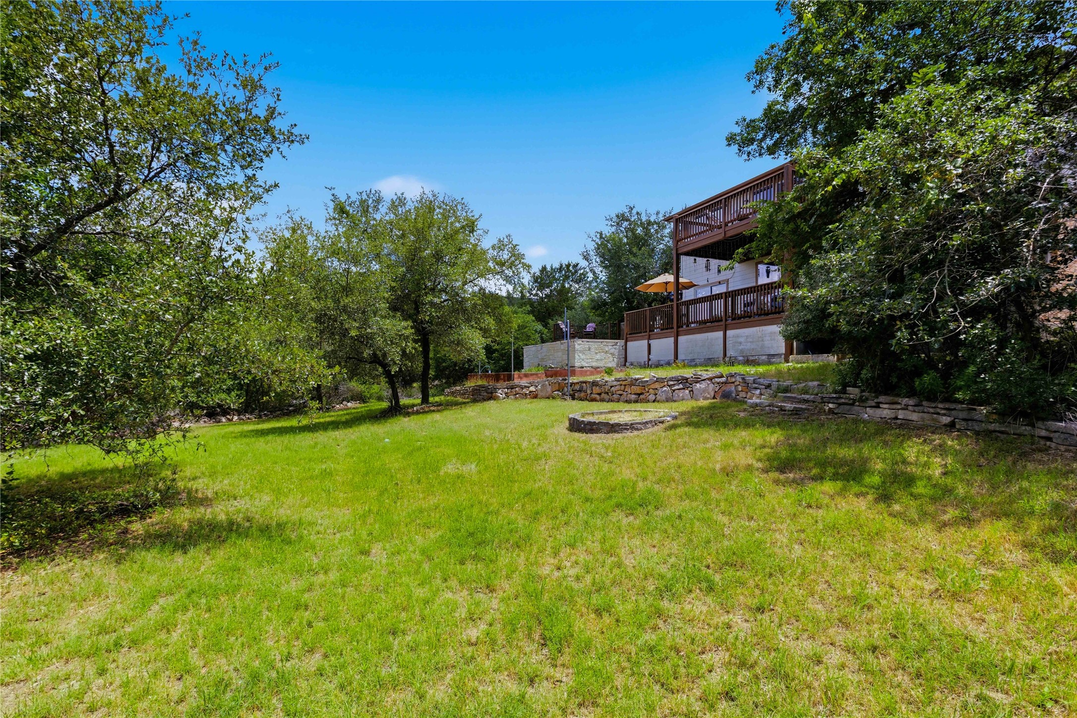 8122 Lime Creek Road Volente, TX 78641 - Photo 31 of 40 The grounds with trails and more