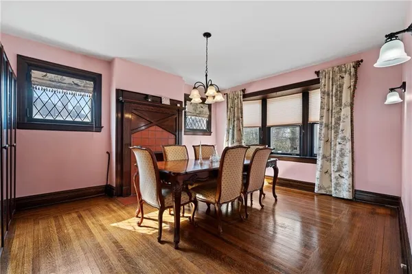 a dining room with furniture window wooden floor