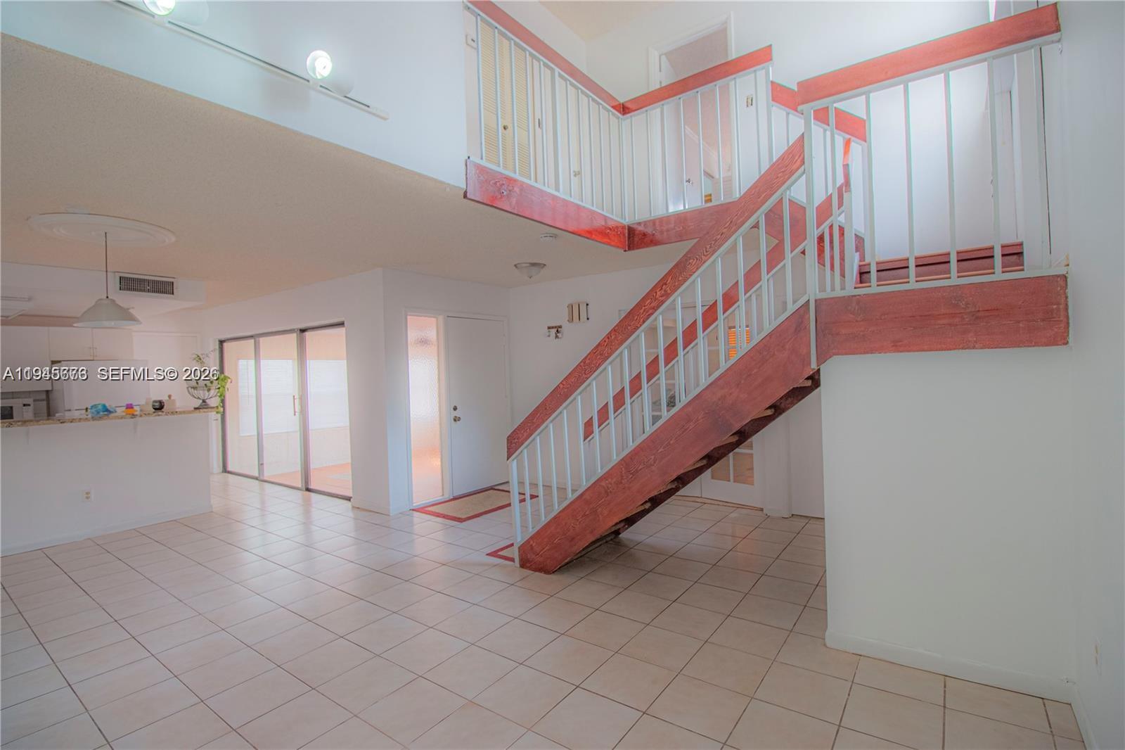 10099 Northwest 4th Lane, Unit 39 Miami, FL 33172 - Photo 13 of 16 a view of an entryway with wooden floor