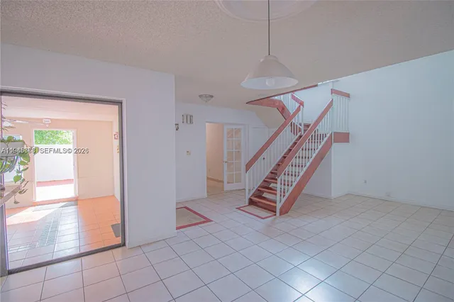 a view of an entryway with stairs