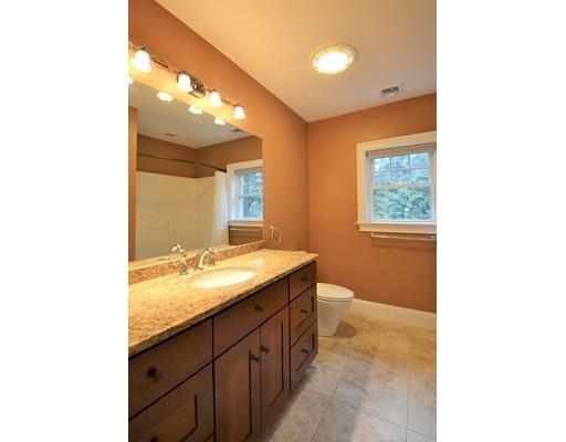 3 Stonefield Circle Winchester, MA 01890 - Photo 14 of 25 a bathroom with a granite countertop sink and a mirror