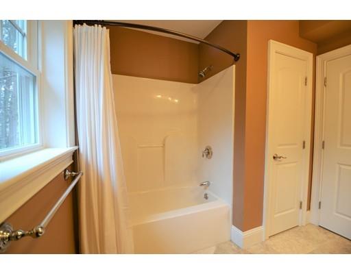 3 Stonefield Circle Winchester, MA 01890 - Photo 15 of 25 a bathroom with a bathtub and a shower
