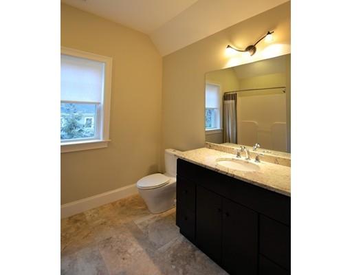3 Stonefield Circle Winchester, MA 01890 - Photo 18 of 25 a bathroom with a granite countertop sink toilet and mirror