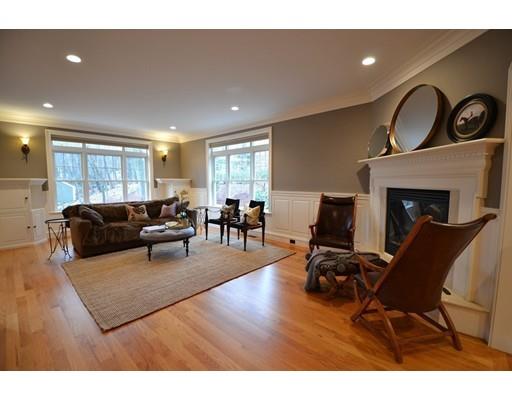 3 Stonefield Circle Winchester, MA 01890 - Photo 2 of 25 a living room with furniture and a fireplace