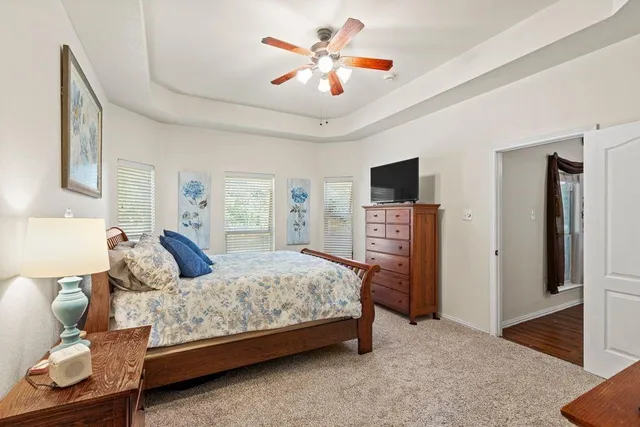 a bedroom with a bed and furniture