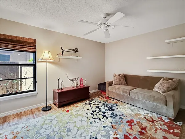 a living room with furniture and window