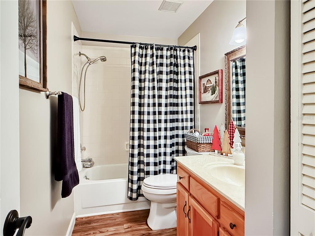 1001 Lennox Road West Palm Harbor, FL 34683 - Photo 20 of 27 a bathroom with a sink toilet and shower