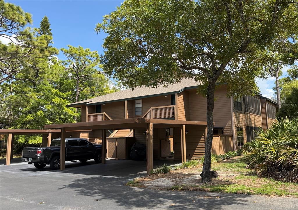 1001 Lennox Road West Palm Harbor, FL 34683 - Photo 2 of 27 a view of a car park in front of house