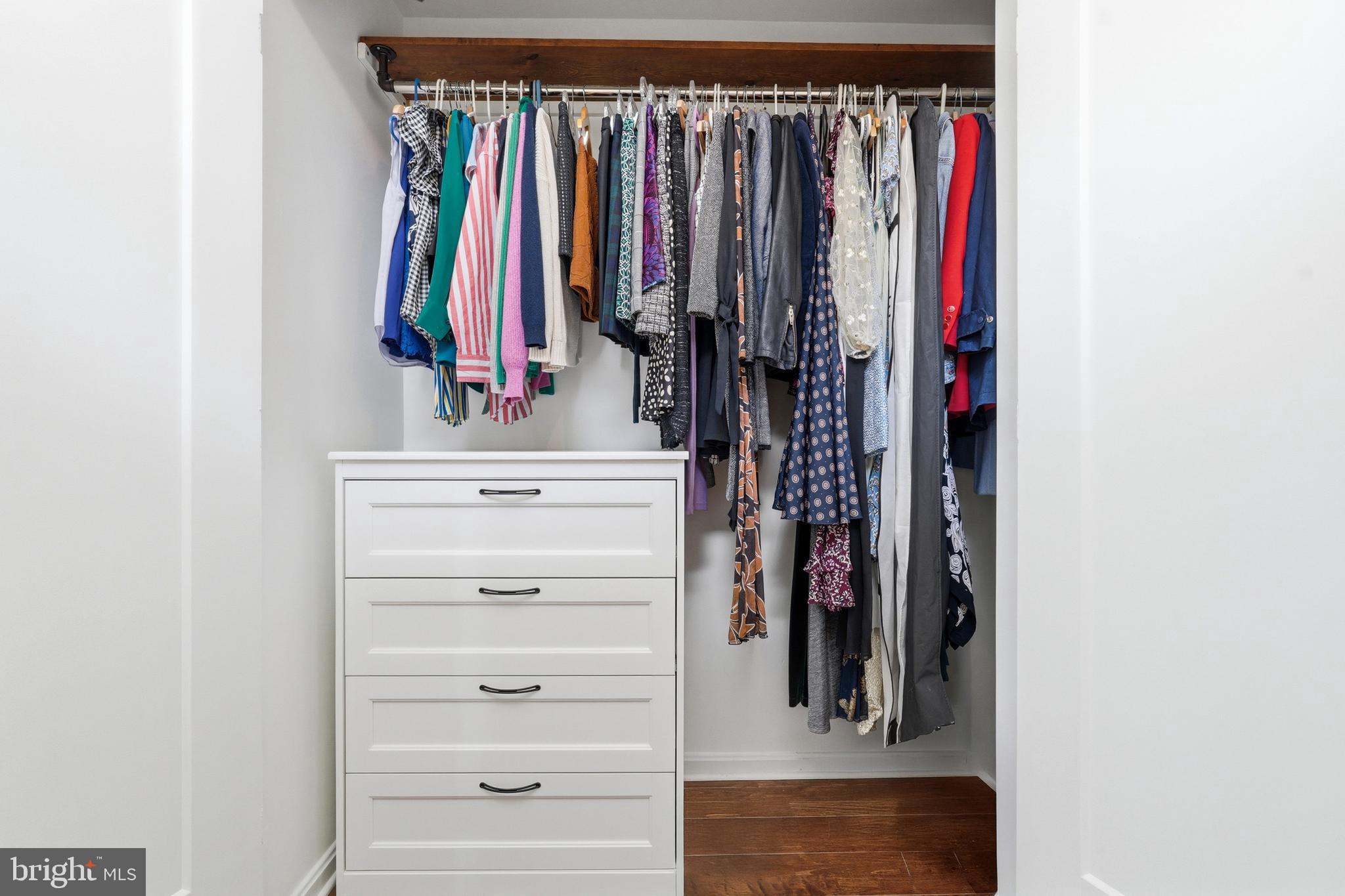 13513 Giant Court Germantown, MD 20874 - Photo 20 of 37 a view of walk in closet with clothes and shoes