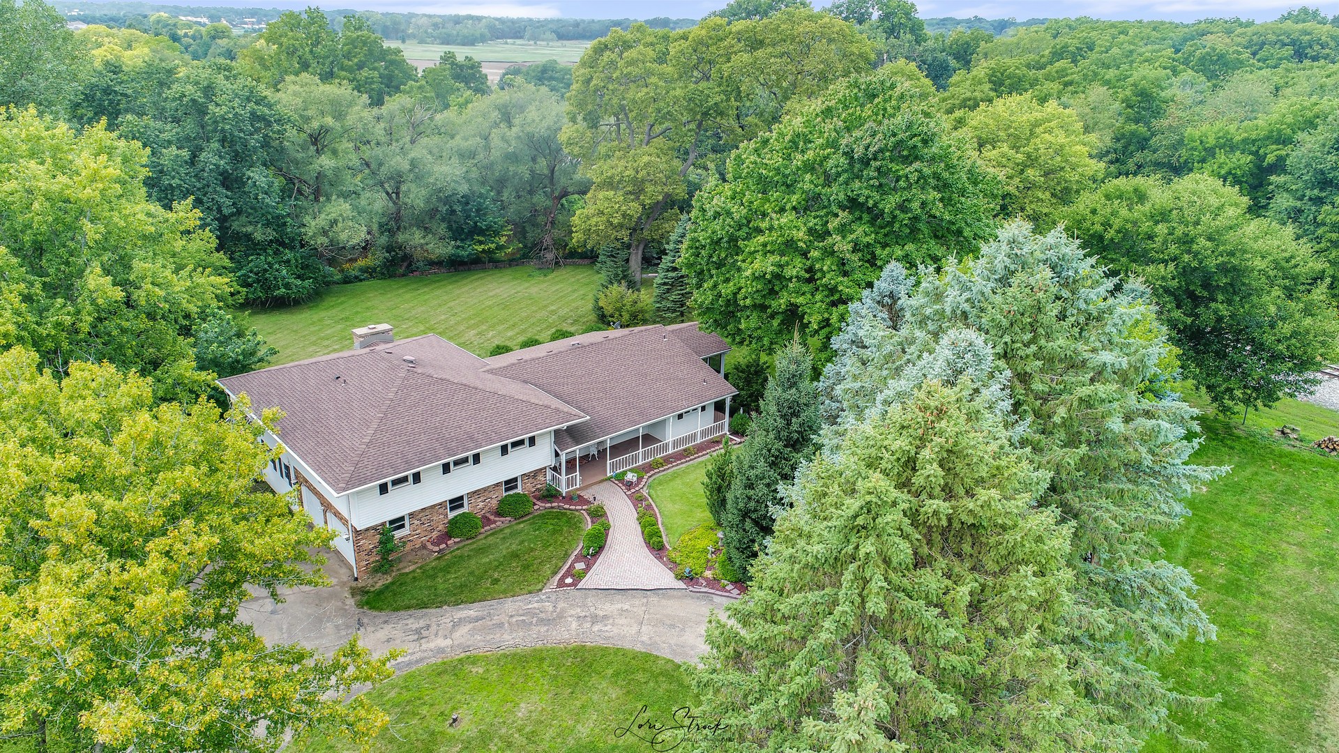 501 Marley Road New Lenox, IL 60451 - Photo 3 of 71 an aerial view of a house with a yard and a large tree