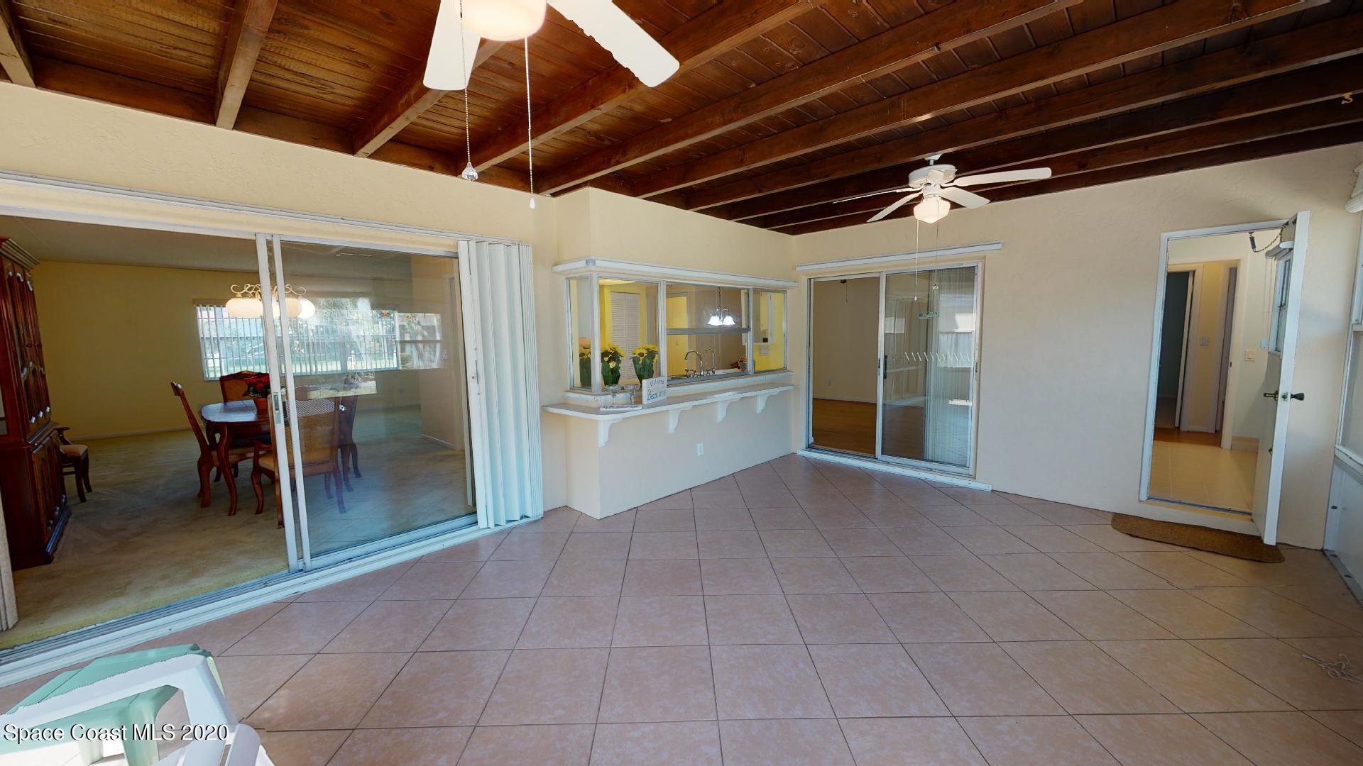 645 Bimini Road Satellite Beach, FL 32937 - Photo 14 of 29 large enclosed porch
