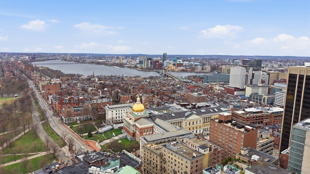 21 Beacon Street, Unit 11L Boston, MA 02108 - Photo 23 of 23 an aerial view of a city with lots of residential buildings
