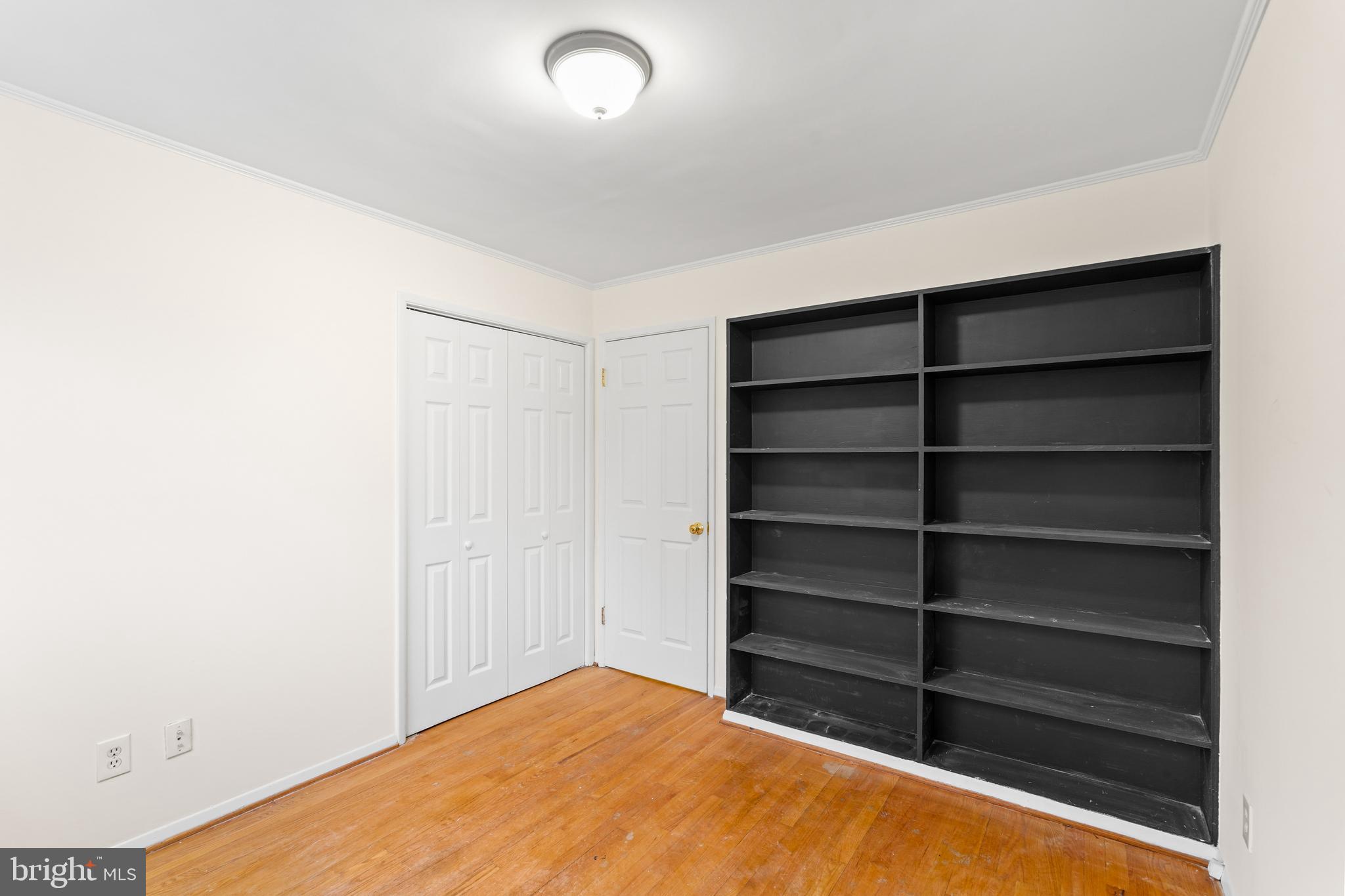 7423 Exmore Street Springfield, VA 22150 - Photo 22 of 39 a view of a room with empty racks